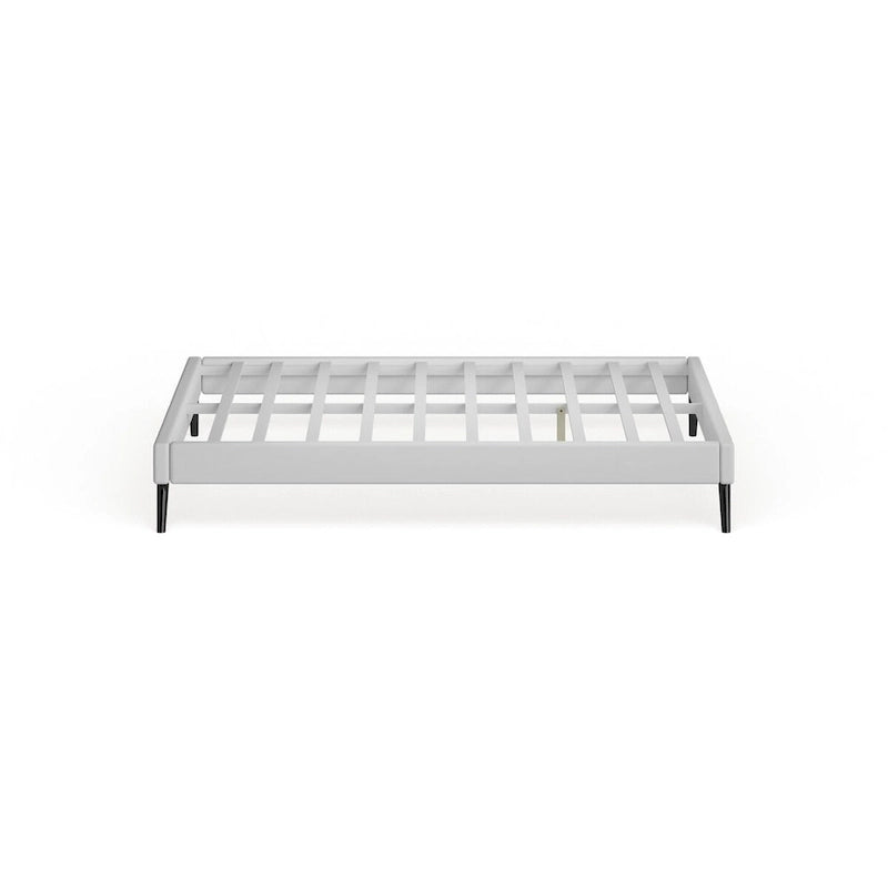 Lit plateforme grand lit en bois blanc avec pieds ronds évasés